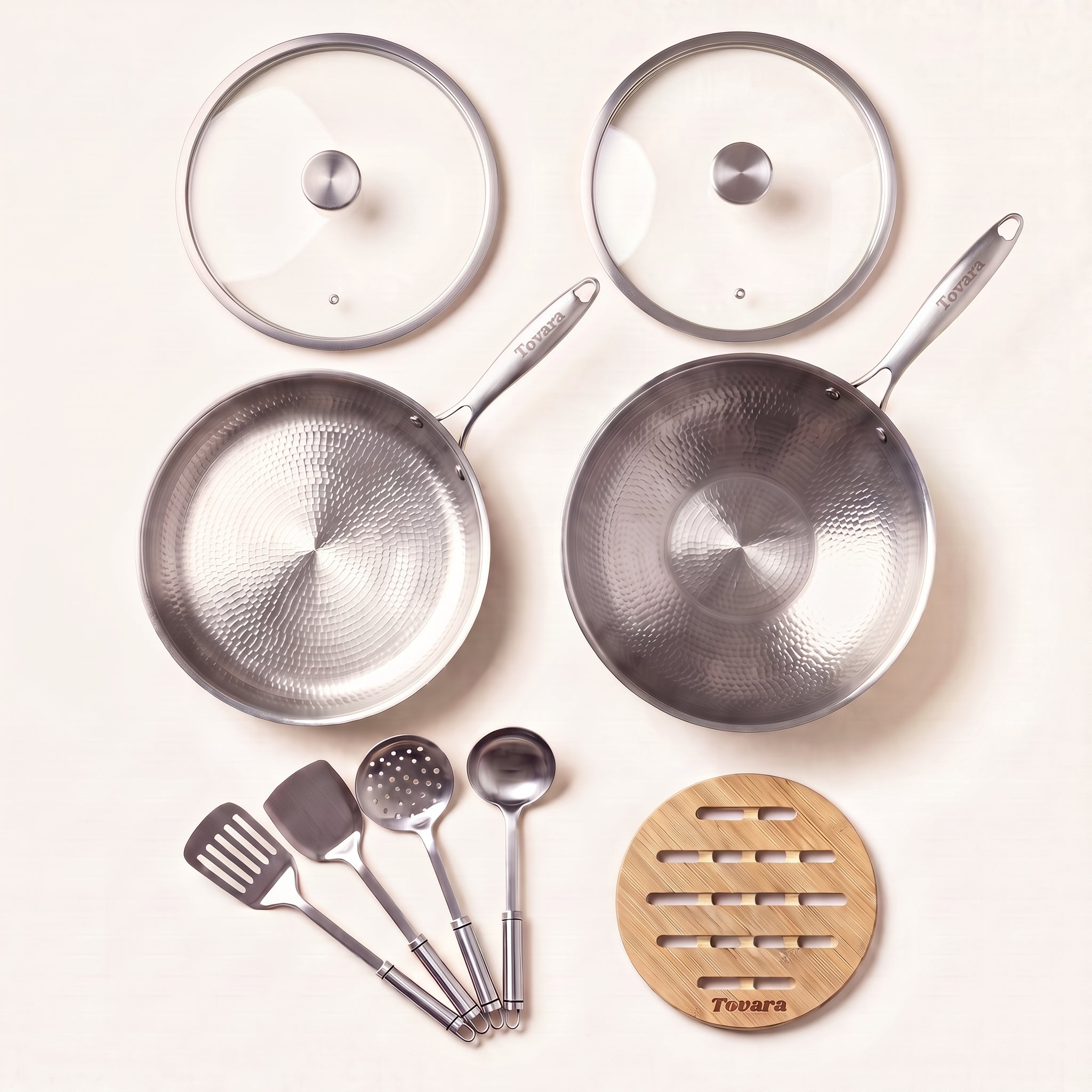 TitaniumPro Basic Pan Set: two pans, utensils, two glass lids and a bamboo trivet